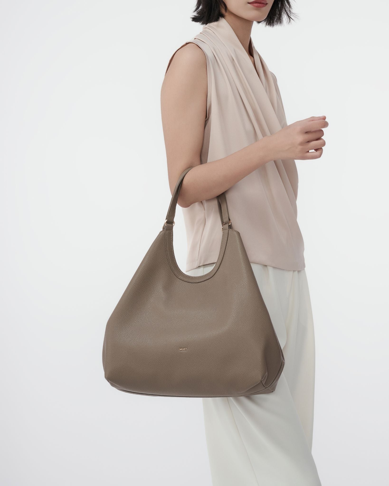 MUET Trapezium shoulder bag